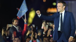 Emmanuel Macron celebrates after his victory in France’s presidential election, at the Champ de Mars in Paris.