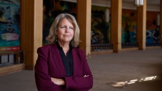 Sherry Williams, executive director of One Treasure Island, poses for a photo at her office on Tuesday, April 5, 2022, in San Francisco.