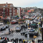 Emergency vehicles and the NYPD crowd the streets after at least 16 people were injured during a rush-hour shooting at a subway station Brooklyn, New York, on April 12, 2022.