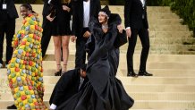 NEW YORK, NEW YORK - SEPTEMBER 13: Rapper ASAP Rocky (L) and singer Rihanna attends the 2021 Met Gala Celebrating In America: A Lexicon Of Fashion at the Metropolitan Museum Of Art on September 13, 2021 in New York City. (Photo by Ray Tamarra/GC Images)