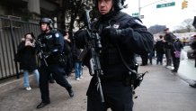 Police and first responders gather at the 36th Street subway station in the Brooklyn neighborhood of Sunset Park, April 12, 2022, in New York.