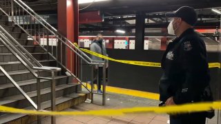 police at scene of stabbing on subway platform