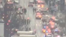 Police and first responders swarm the Brooklyn neighborhood of Sunset Park in New York, after multiple people were shot or hurt at the height of morning rush hour, April 12, 2022.