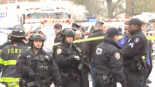 Police and first responders swarm the Brooklyn neighborhood of Sunset Park in New York, after multiple people were shot or hurt at the height of morning rush hour, April 12, 2022.