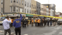 Police and first responders swarm the Brooklyn neighborhood of Sunset Park in New York, after multiple people were shot or hurt at the height of morning rush hour, April 12, 2022.