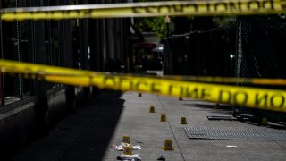 The crime scene at 10th Street and J Street in downtown Sacramento where 6 people were killed and 12 injured in the early morning hours Sunday in Sacramento, California. (Melina Mara/The Washington Post via Getty Images)