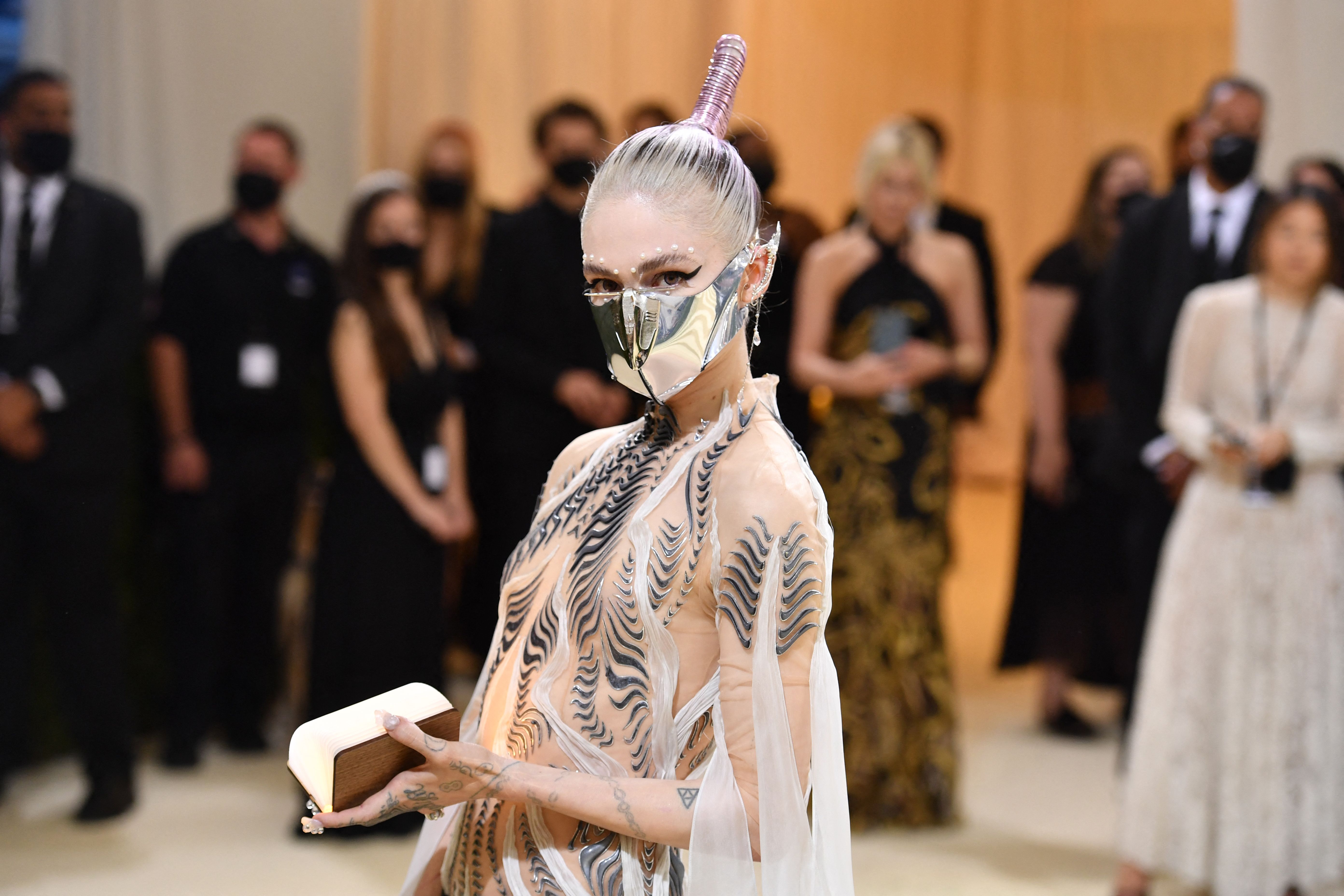 Grimes Auctioning Off Met Gala 