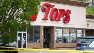 BUFFALO, NY – MAY 14:
A shooter has been taken into custody after firing on multiple people at the Tops Friendly Market on Jefferson Avenue and Riley Street in Buffalo on May 14, 2022. (Photo by