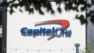 Signage is displayed on the exterior of a Capital One Financial Corp. cafe branch in Walnut Creek, California, U.S., on Tuesday, July 18, 2017.