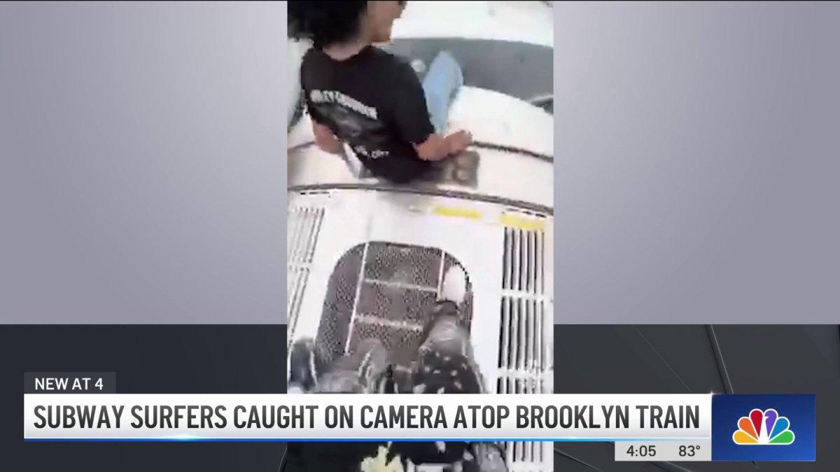 Brooklyn subway surfers' stunt caught on camera