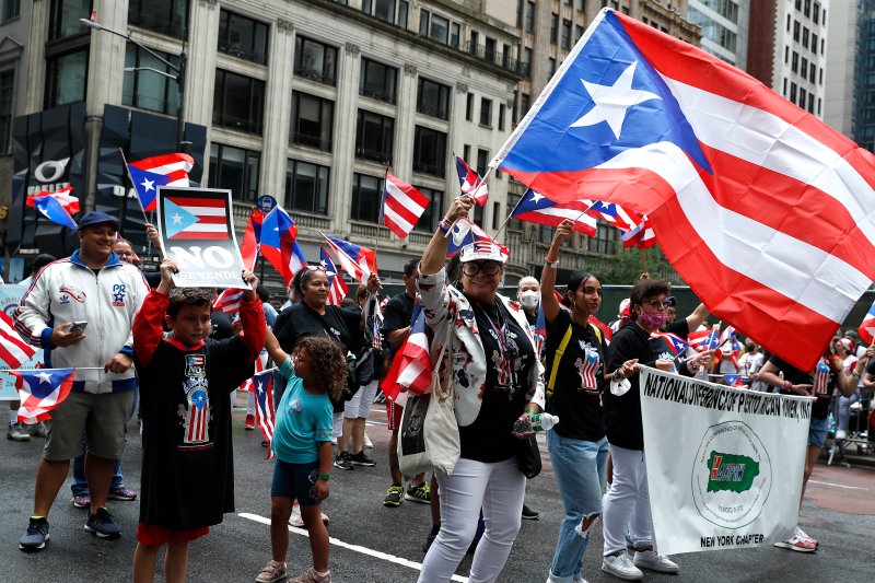 Photos: Sea of Puerto Rican Flags Mark Parade Comeback