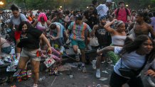 People run out of Washington Square Park after fireworks were mistaken for gunfire