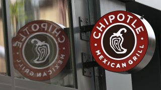A Chipotle Mexican Grill sign is seen in the Park Slope neighborhood in the Brooklyn borough of New York City.