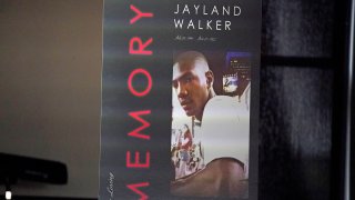 This is a poster on the stage during a news conference following the funeral service for Jayland Walker