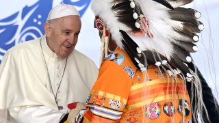 Pope Francis (L) speaks to members of the Indigenous community at Muskwa Park in Maskwacis, Alberta, Canada, on July 25, 2022.