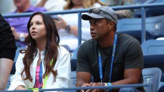 Erica Herman and Tiger Woods look on prior to the match between Anett Kontaveit of Estonia and Serena Williams of the United States in their Women's Singles Second Round match on Day Three of the 2022 US Open at USTA Billie Jean King National Tennis Center on August 31, 2022 in the Flushing neighborhood of the Queens borough of New York City.