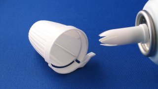 Top of a whipped cream canister