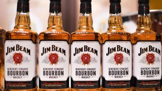 Bottles of Jim Beam Kentucky Straight Bourbon whiskey stand on display during a news conference in Tokyo, Japan, Jan. 30, 2020.