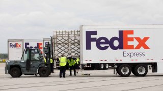 FedEx trucks at Indianapolis International Airport in Indianapolis, Indiana.