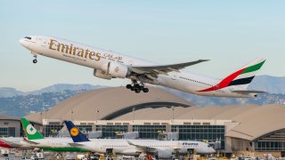 Emirates airlines Boeing 777-31H(ER) takes off from Los Angeles international Airport on January 13, 2021.