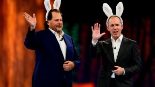 Bret Taylor, co-chief executive officer of Salesforce.com Inc., right, and Marc Benioff, co-chief executive officer of Salesforce.com Inc., wear rabbit ears during a keynote at the 2022 Dreamforce conference in San Francisco, California, on Tuesday, Sept. 20, 2022.