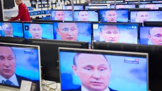 Russian President Vladimir Putin on TV.