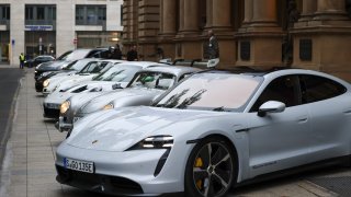 Porsche shares rose in their stock market debut Thursday, in one of the biggest public offerings in Europe ever.