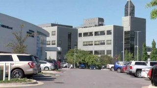One person is dead and a person of interest is in custody after a shooting at an Arkansas hospital Wednesday morning.