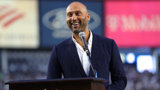 Baseball Hall of Famer Derek Jeter speaks prior to the game between the Tampa Bay Rays and the New York Yankees at Yankee Stadium