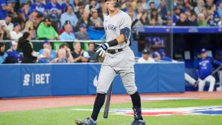 TORONTO, ON – SEPTEMBER 26: Aaron Judge #99 of the New York Yankees reacts to striking out against the Toronto Blue Jays in the sixth inning during their MLB game at the Rogers Centre on September 26, 2022 in Toronto, Ontario, Canada.