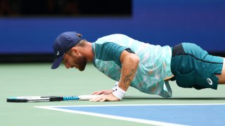NEW YORK, NEW YORK – SEPTEMBER 04: Corentin Moutet of France falls on the court against Casper Ruud of Norway during their Men’s Singles Fourth Round match on Day Seven of the 2022 US Open at USTA Billie Jean King National Tennis Center on September 04, 2022 in the Flushing neighborhood of the Queens borough of New York City.