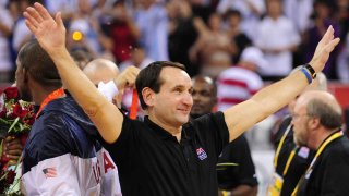 Aug 24, 2008; Beijing, CHINA; USA coach Mike Krzyzewski celebrates after the awards ceremony for the mens basketball gold medal game against Spain at the Beijing Olympic Basketball Gymnasium during the 2008 Beijing Olympic Games. USA beat Spain 118-107 to win the gold medal. Mandatory Credit: Bob Donnan-USA TODAY Sports