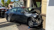 Car with significant frontend damage crashed into fast food restaurant