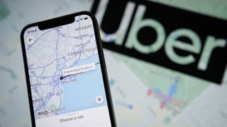 The Uber app application with a map of New York City is seen on an Apple iPhone mobile phone in this photo illustration Warsaw, Poland on 21 September, 2022.