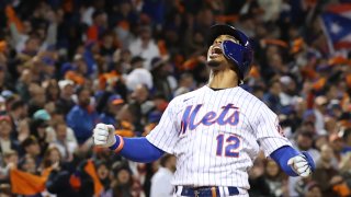 Francisco Lindor #12 of the New York Mets celebrates a solo home run during the first inning against the San Diego Padres in game two of the Wild Card Series at Citi Field on October 08, 2022 in New York City. (Photo by Elsa/Getty Images)