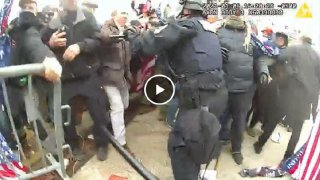 John O'Kelly seen fighting with police officers during Jan. 6 riot