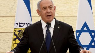 Israeli Prime Minister Benjamin Netanyahu speaks at a ceremony in Jerusalem, April 13, 2021.