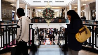 Shoppers at the King of Prussia mall in King of Prussia, Pennsylvania, on Saturday, Dec. 4, 2021.