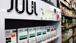 Packages of Juul e-cigarettes are displayed for sale in the Brazil Outlet shop on June 22, 2022 in Los Angeles, California.