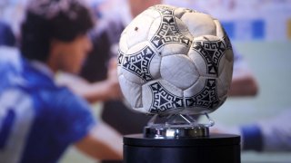 The match ball used in the 1986 FIFA World Cup Quarter-Final football match between Argentina and England, played at the Estadio Azteca, Mexico City, is pictured during a photocall ahead of its auction, at Wembley Stadium in London on November 1, 2022.