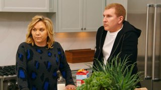 A screengrab from Chrisley Knows Best episode 809, "Let's Talk About Sex, Grayson." Pictured from left: Julie Chrisley, Todd Chrisley.