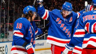 Artemi Panarin #10 of the New York Rangers celebrates with teammates after scoring a goal in the third period against the Los Angeles Kings at Madison Square Garden on February 26, 2023 in New York City.