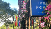 Gay pride flag hangs outside of Little Prince restaurant in Manhattan.