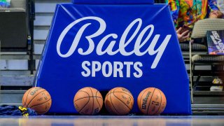 A view of the Bally s Sports logo and basketball bastion and Wilson game balls before the game between the Dallas Mavericks and the Denver Nuggets at the American Airlines Center.