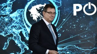 Pfizer CEO Albert Bourla arrives on stage to deliver a speech during the inauguration ceremony of the companys new center for Digital Innovation and Business Operations and Services, in Thessaloniki, on October 12, 2021.