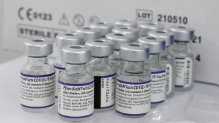 Vials containing the Pfizer/BioNtech vaccine against the coronavirus disease (COVID-19) are displayed before being used at a mobile vaccine clinic, in Valparaiso, Chile, January 3, 2022.