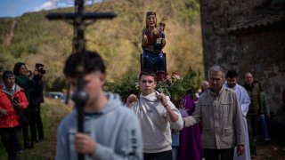Local residents take part in a procession carrying a statue of the Our Lady of the Torrents, a virgin historically associated with drought, in l'Espunyola, north of Barcelona, Spain, March 26, 2023. Farmers and parishioners gathered Sunday at the small hermitage of l'Espunyola, a rural village in Catalonia, to attend a mass asking the local virgin Our Lady of the Torrents for rain. Prayers and hymns were offered to ask for divine intervention in solving the earthly crisis.