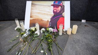 File - A memorial is displayed for Tyre Nichols at the Embrace statue in Boston on Jan. 28, 2023.
