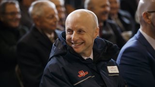 Andy Byford, chief executive officer of the Toronto Transit Commission (TCC), center, smiles during the opening of the TCC Line 1 extension in Vaughan, Ontario, Canada, on Friday, Dec. 15, 2017. The subway expansion is among the largest in North America in recent decades, with six new stations and 8.6 kilometres (5.3 miles) of new track. It will allow riders to get from Vaughan Metropolitan Centre to the Sheppard West station in about 14 minutes, and to Union Station in 42 minutes. Photographer: Cole Burston/Bloomberg via Getty Images