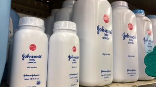 Containers of Johnson’s baby powder made by Johnson and Johnson are displayed on a shelf on July 13, 2018 in San Francisco, California.